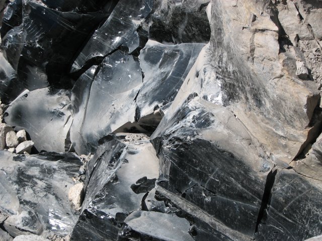 An unbelievable mountain of black glass